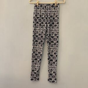 Silver one size  black and white patterned leggings NWT